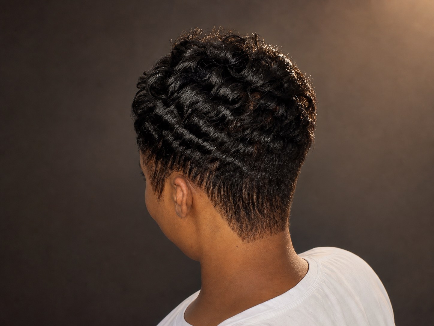 Polished pixie cut and style by Teddy Chisom